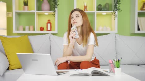 thoughtful business woman considering investing.