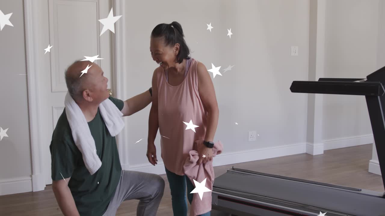 Couple in fitness ending treadmill workout, woman wiping towel, man kneeling helping, star overlay