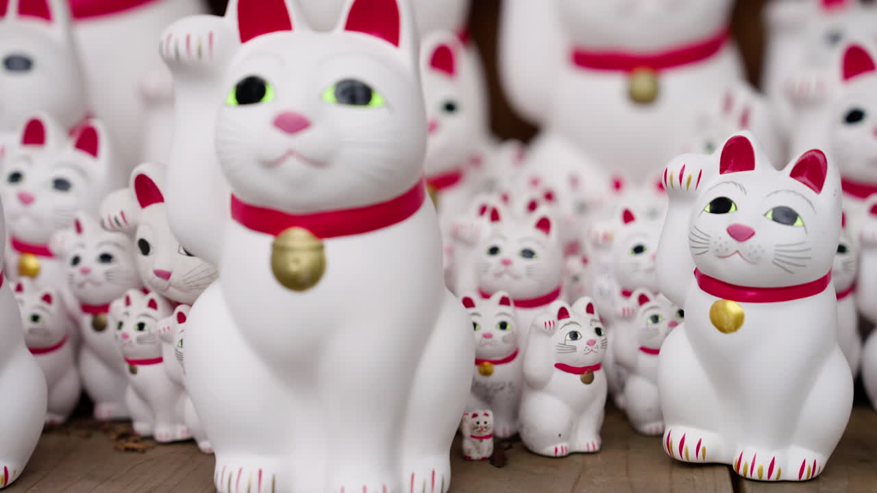 Many Maneki Neko Lucky Cat Figurines