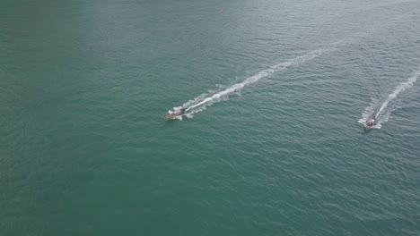 arial footage of longtail boats in the beautiful railay beach thailand