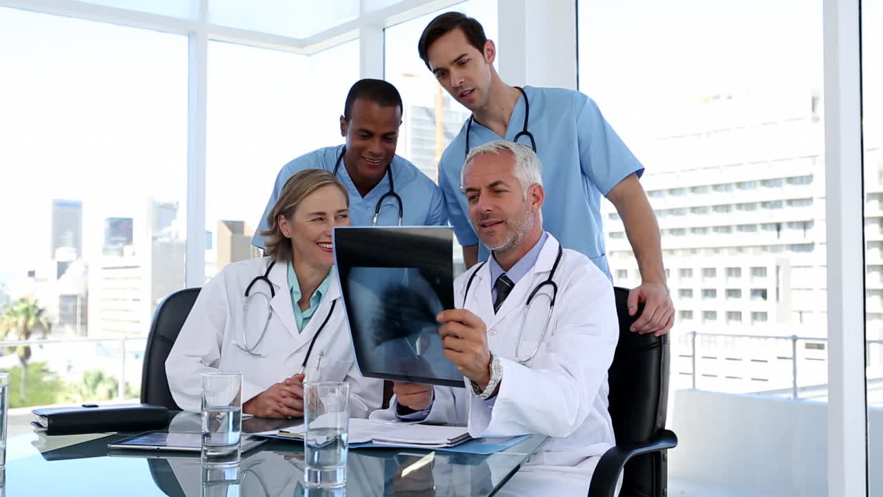 Group of doctors examining an xray together