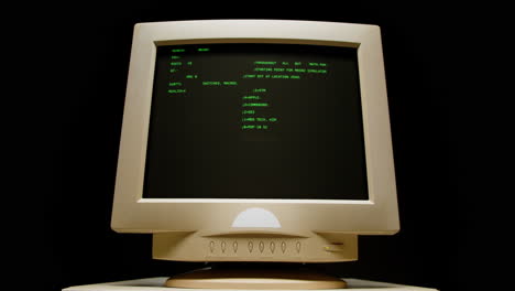 Vintage Computer Monitor Displaying Text-Based Interface