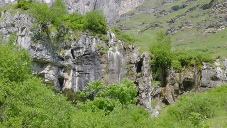 mesmerising staubifall waterfall and its surroundings shot in the canton of uri, swiss alps, switzerland