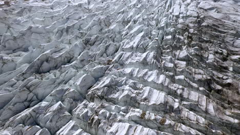 drone shot starting downward and tilting up to reveal glacier at fairy meadows pakistan, cinematic aerial shot