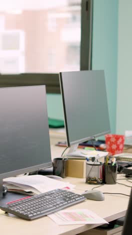 coworking space with laptop empty of people