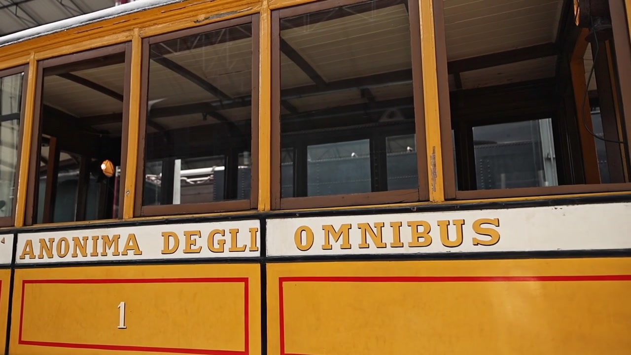 Vintage Yellow Tram Car in a Museum Setting