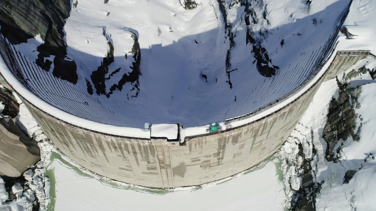 Aerial of a dam in winter