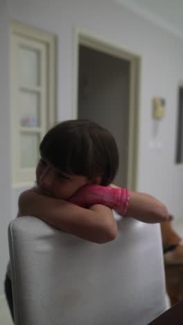 girl sitting in a chair