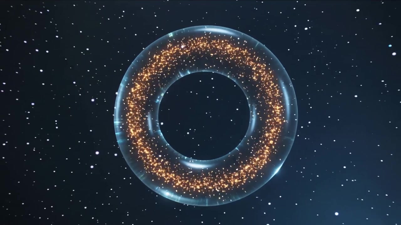 Ved animationsstart roterer en glastorus, pulserer og sender guldgnister ud i mørkeblå stjerner, der danner en varm ring.