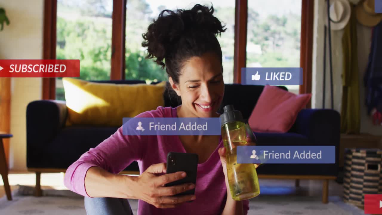 Animation of social media icons and data processing over biracial woman using smartphone