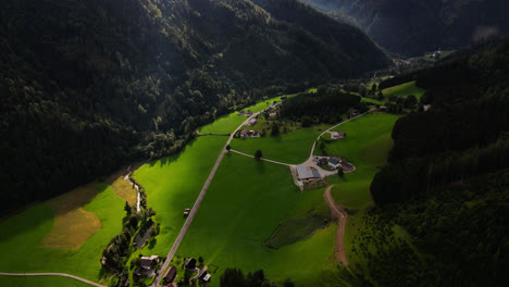 a slow revealing drone shot of the town johnsbach in gesause national park, austria