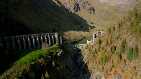 aerial view of gleno dam in the italian alps