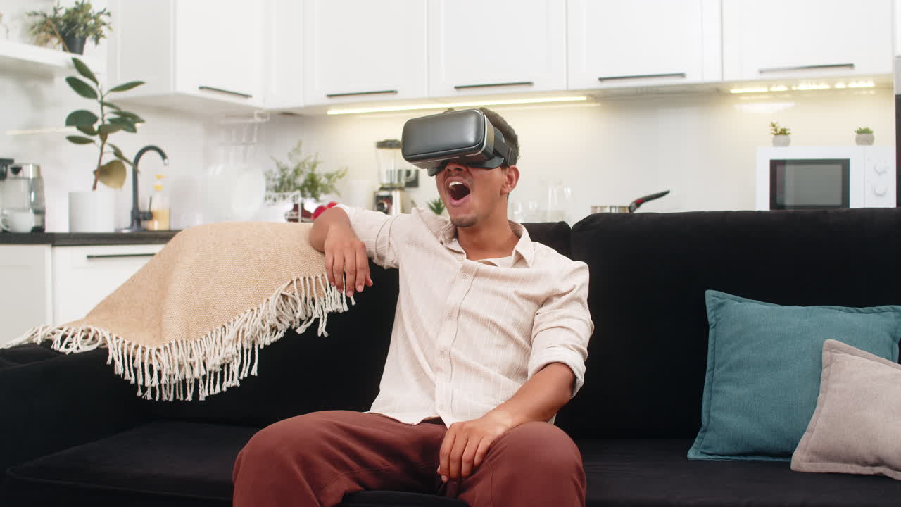 Indian man with vr headset says wow watches online content enjoys film style video and relaxes more
