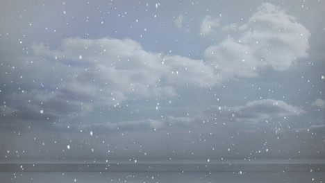 Animation-of-snow-falling-in-seamless-loop-over-clouded-sky-in-background