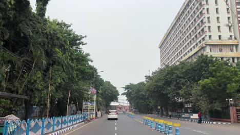 pov shot of road approaching babu ghat entry near hoogly river in kolkata.