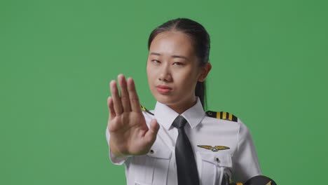 pilot making a stop gesture