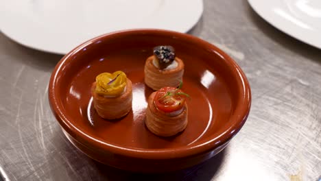 french appetizer plated by chef – elegant fine dining starter dish presentation