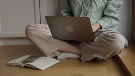 woman working from home on laptop