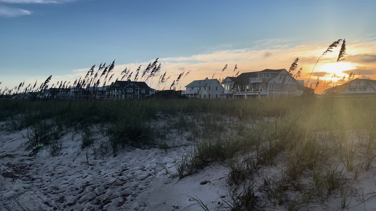 Golden Sunset Over the Beach Houses and Dunes in Wilmington