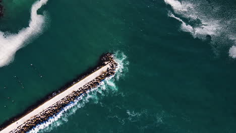 Swell-surges-gently-against-dolosse-of-Hermanus-pier