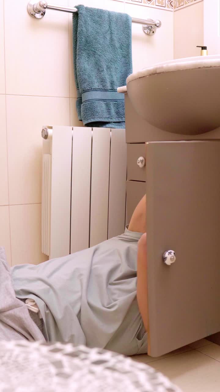 Man trying to fix sink problem calls technician