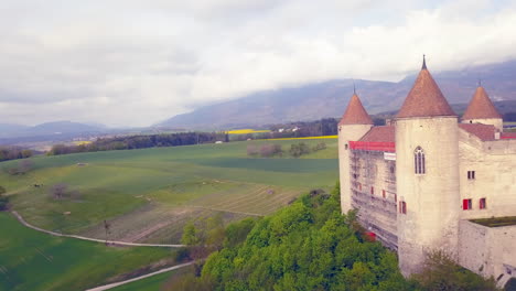 champvent castle during restoration works, switzerland. aerial view