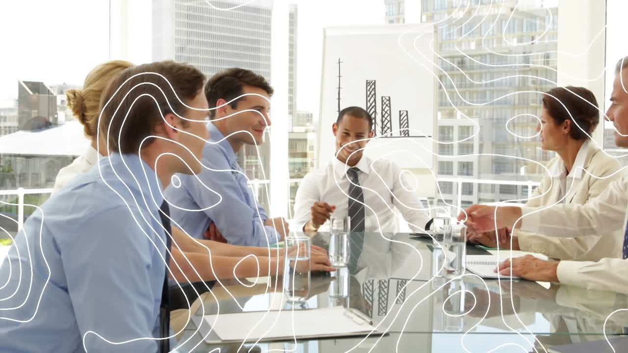 topografía contra diversos empresarios que se dan la mano en una sala de reuniones en la oficina