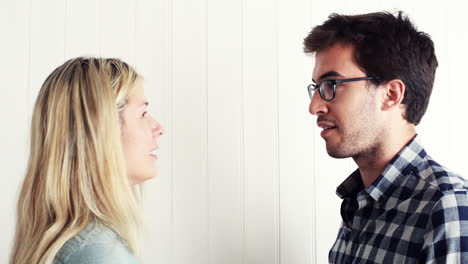 young couple fighting in new family home