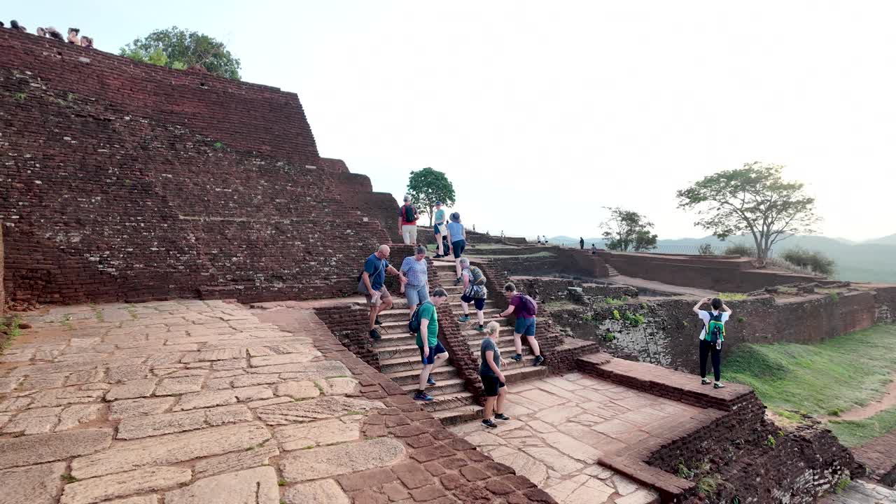Tourists Exploring the Ancient Ruins of Sigiriya, Sri Lanka
