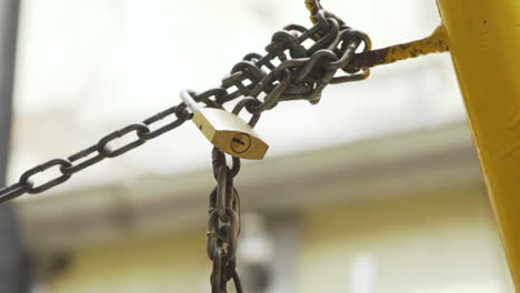 a locked padlock and chain for security in mexico city street
