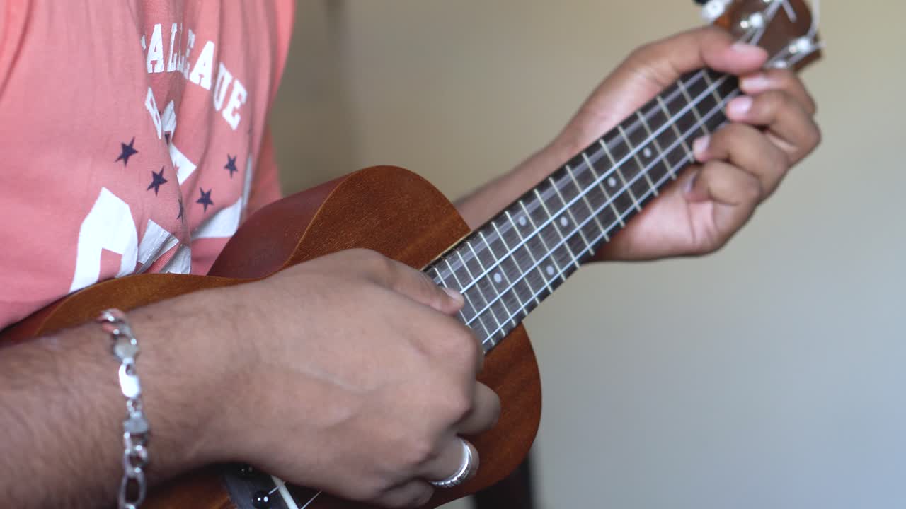 The ʻukulele or ukelele is a member of the lute family of instruments. It generally employs four nylon strings. This is a video of a guy playing Ukelele during the quarantine.
