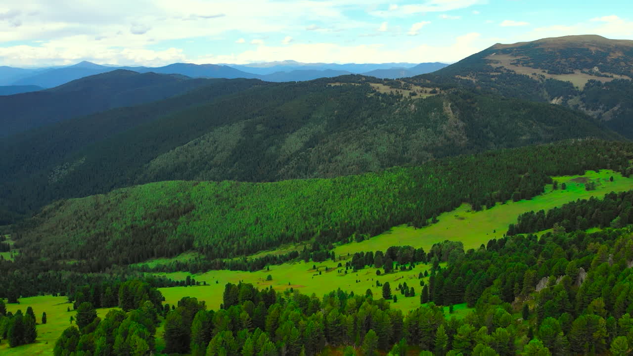 Scenic view of mountains and forest landscape