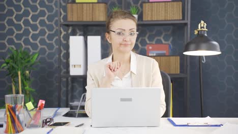 Business-woman-telling-camera-to-shut-up.