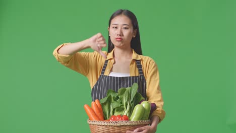 woman disapproving of vegetables