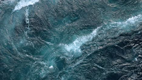 Blue-waves-of-water-of-the-river-and-the-sea-meet-each-other-during-high-tide-and-low-tide.