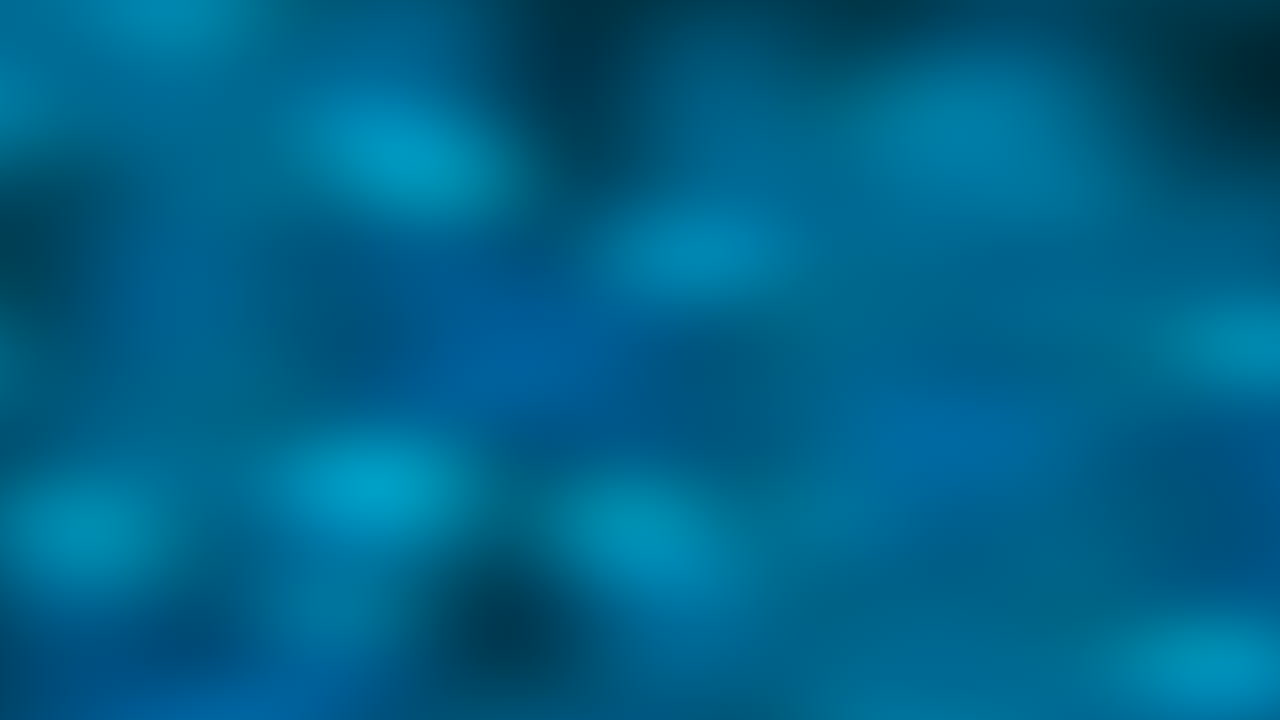 una imagen abstracta con un fondo azul borroso y puntos blancos esparcidos