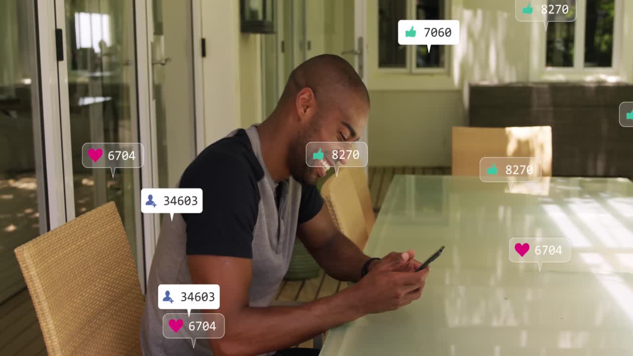 Animation of social media icons, numbers and data processing over biracial man with smartphone