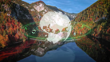 Mountain-lake-during-peak-foliage-and-a-rotating-globe-and-sustainability-symbols