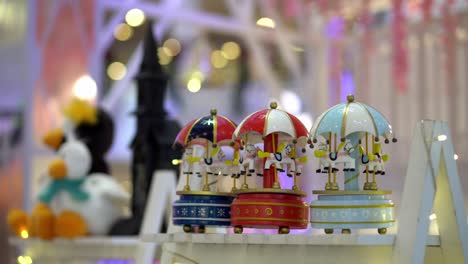 select focus carousel toy in blur bokeh