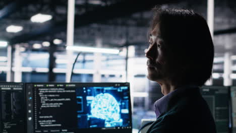 data center software developer using computer to monitor neural network ai llm