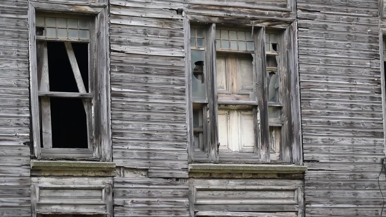 Old Wooden Building with Broken Windows