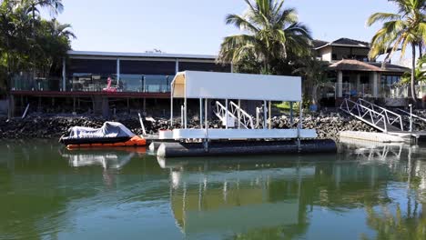 boat docking at a canal house