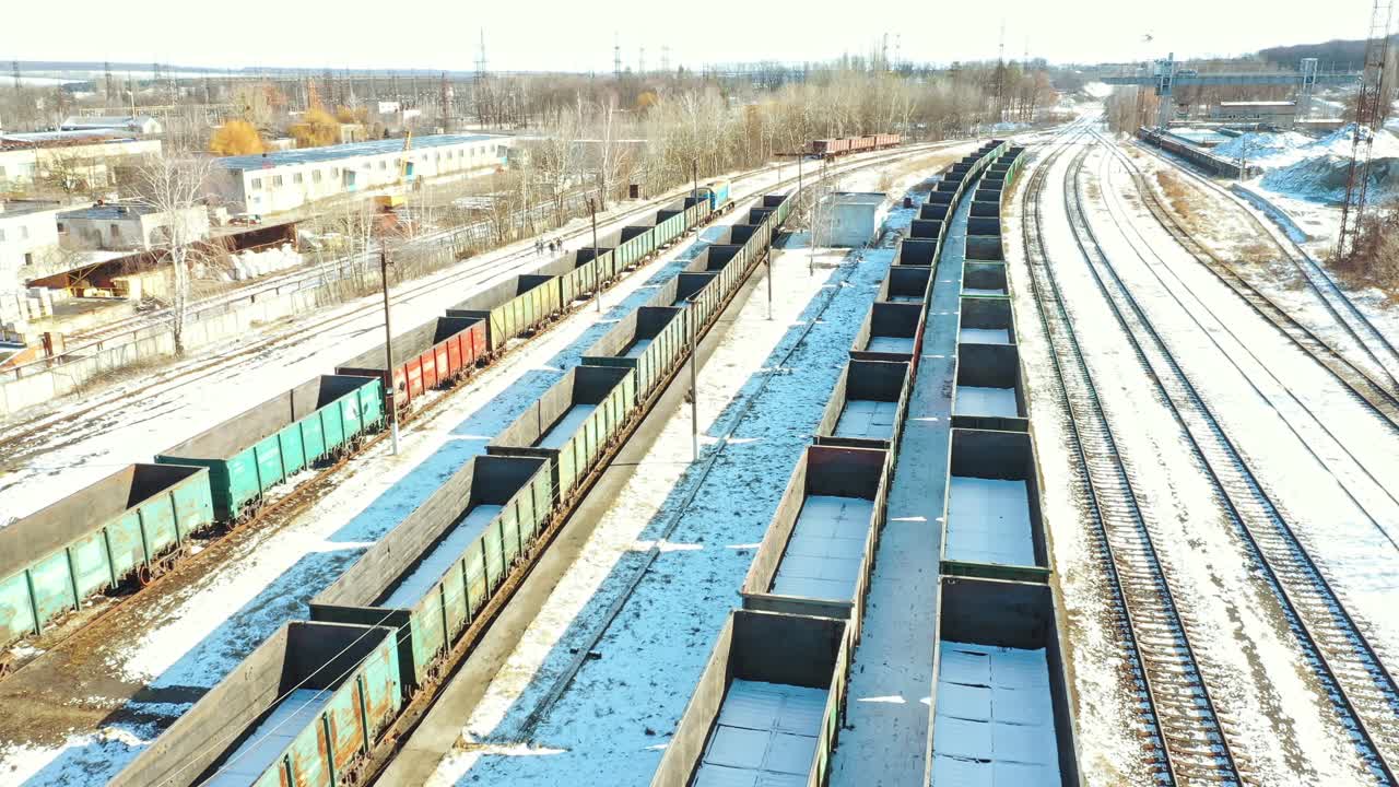 Railway station of freight trains. Cargo train platform with freight train container at depot