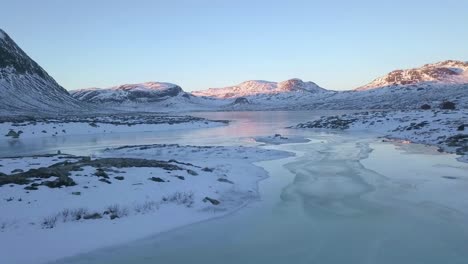 stark landscape of a norwegian fjord in winter