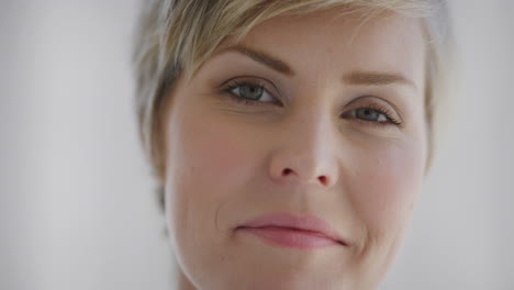 close up portrait of young beautiful blonde woman smiling looking at camera attractive caucasian female with perfect skin real people series