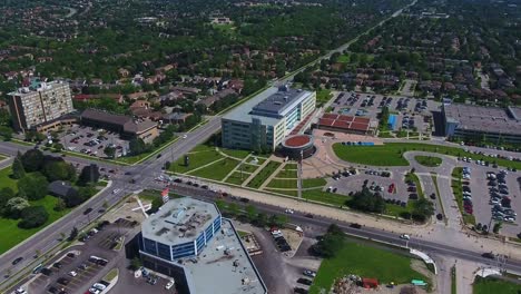 aerial view over the regional municipality of durham, health department over whitby town buildings and roads, ontario, canada