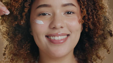 Face-cream,-skincare-and-black-woman-in-studio