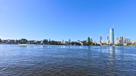 scenic river cruise through gold coast's urban landscape