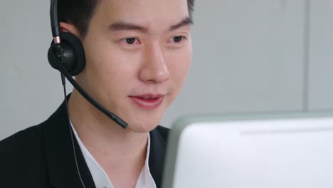 business people wearing headset working in office