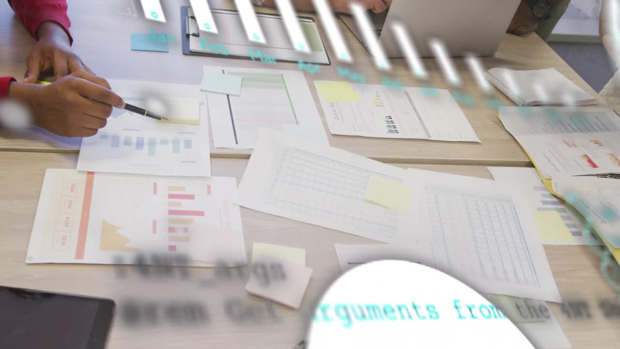 Man pointing pen and woman tapping tablet in business meeting, animating charts analyzing sales